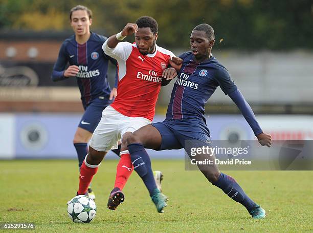 Kaylen Hinds of Arsenal takes on Boubakary Soumare of PSG during the UEFA Youth League match between Arsenal and Paris Saint Germain at Meadow Park...