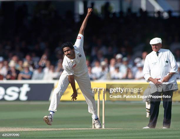 Anil Kumble bowling for India during the 2nd Test match between England and India at Lord's Cricket Ground, London, 20th June 1996. The umpire is...