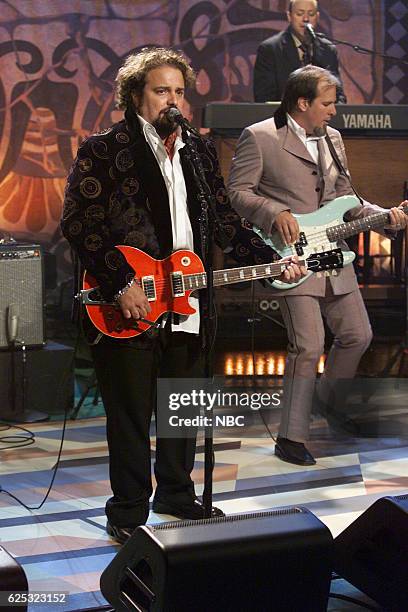 Episode 2566 -- Pictured: Raul Malo, Nick Kane, and Jerry Dale McFadden of musical guest The Mavericks perform on September 29, 2003 --