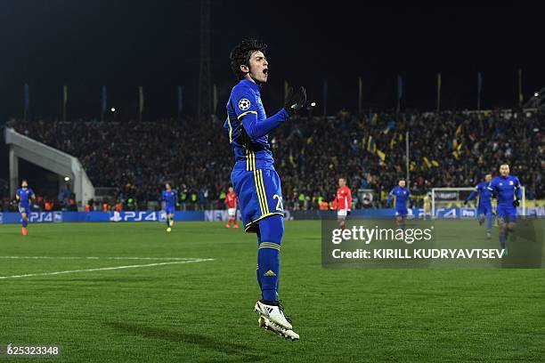 Rostov's Iranian forward Sardar Azmoun celebrates after scoring his team's first goal during the UEFA Champions League football match between FC...