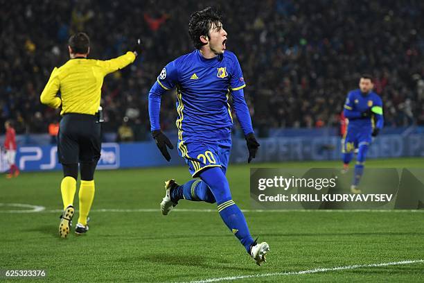 Rostov's Iranian forward Sardar Azmoun celebrates after scoring his team's first goal during the UEFA Champions League football match between FC...