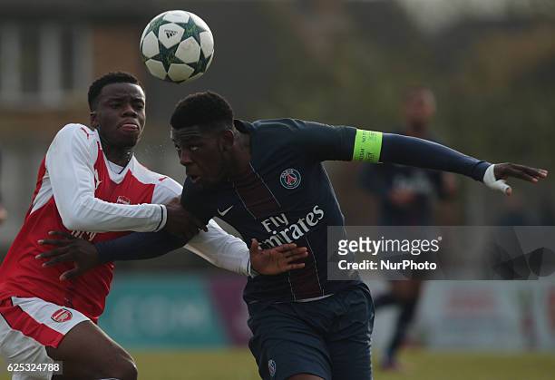 Kaylen Hinds of Arsenal Under 19s and Felix Eboa Eboa of Paris Saint-Germain Under 19s during UEFA Youth League match between Arsenal against Paris...