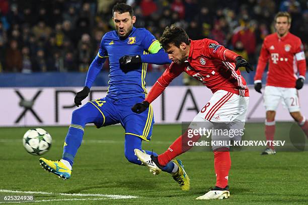 Bayern Munich's Spanish defender Juan Bernat shoots to score his team's second goal during the UEFA Champions League football match between FC Rostov...