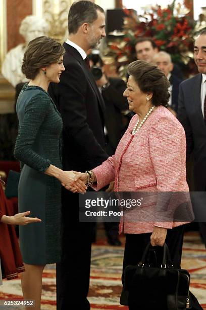 Queen Letizia of Spain greets Senator Rita Barberá in the Hall of Lost Steps of the Congress of Deputies, next to King Felipe VI, who presided today...