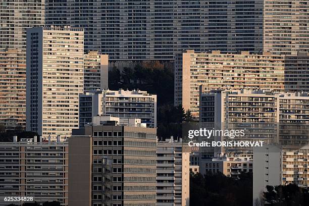 Picture taken on November 23 shows buildings in the East quarter of the French southeastern city of Marseille. / AFP / BORIS HORVAT