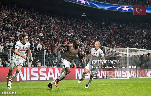 Vincent Aboubakar of Istanbul celebrates his teams third goal with Atinc Nukan and Gokhan Inler during the UEFA Champions League match between...