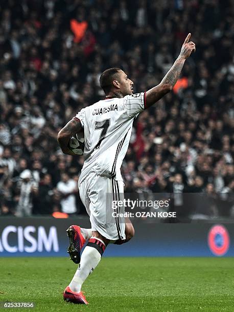 Besiktas' Ricardo Quaresma celebrates with teammates after scoring a goal during the UEFA Champions League Group B football match between Besiktas...