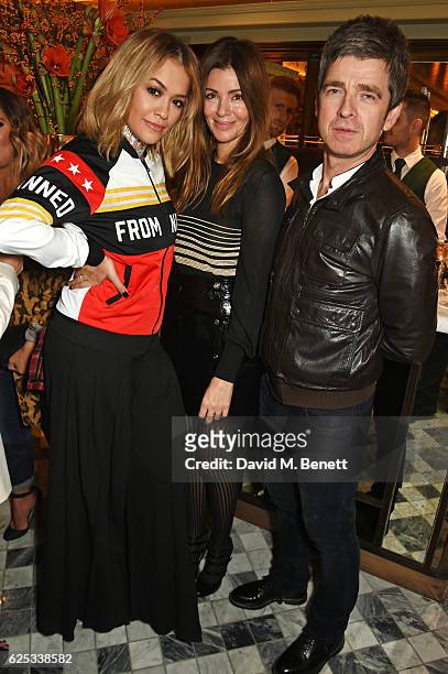 RIta Ora, Sara Macdonald and Noel Gallagher attend the adidas Originals by Rita Ora dinner at The Ivy Chelsea Garden on November 23, 2016 in London,...