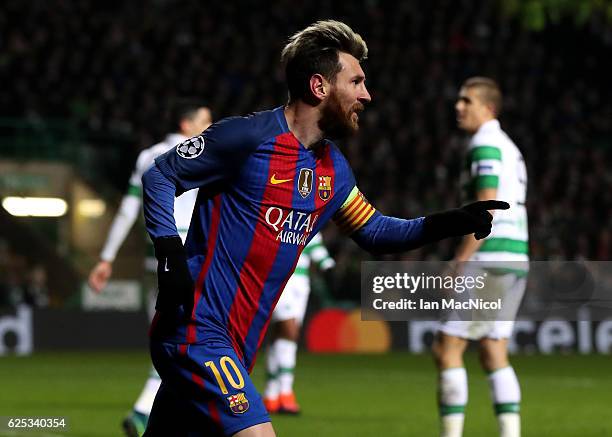 Lionel Messi of Barcelona celebrates scoring his sides first goal during the UEFA Champions League Group C match between Celtic FC and FC Barcelona...