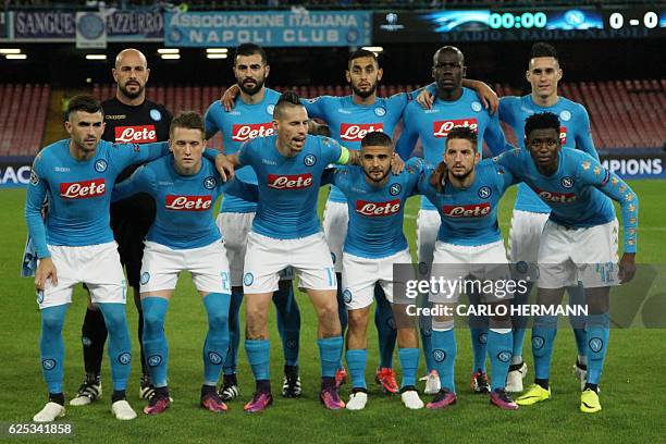 Napoli's team players Napoli's goalkeeper from Spain Pepe Reina, Napoli's defender from Spain Raul Albiol, Napoli's defender from Algeria Faouzi...