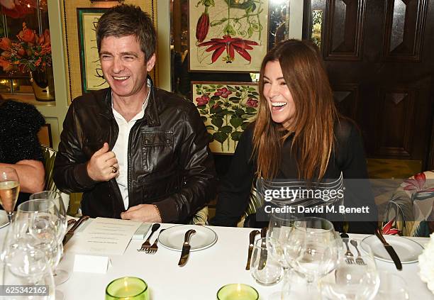 Noel Gallagher and Sara Macdonald attend the adidas Originals by Rita Ora dinner at The Ivy Chelsea Garden on November 23, 2016 in London, England.