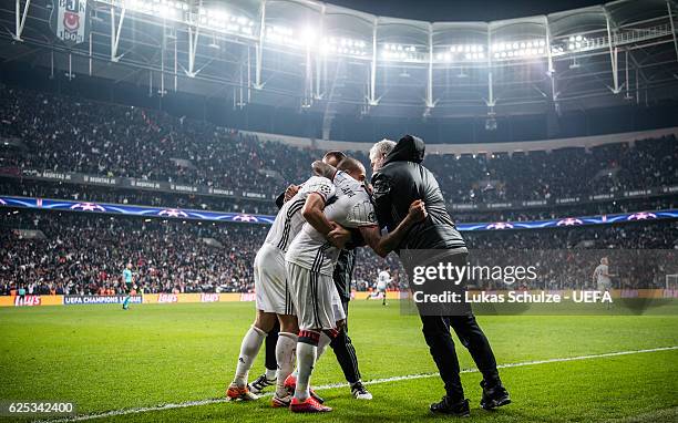 Team members of Istanbul celebrate their teams third goal during the UEFA Champions League match between Besiktas JK and SL Benfica at Vodafone Arena...