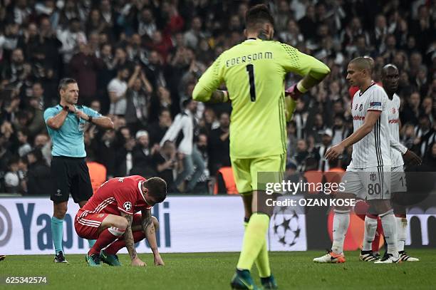 Benfica's Benfica's Swedish defender Victor Nilsson-Lindelof reacts after the UEFA Champions League Group B football match between Besiktas Istanbul...