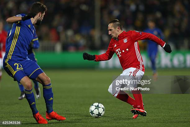 Miha Mevlja of FC Rostov and Franck Ribéry of FC Bayern Munich vie for the ball during the UEFA Champions League Group D football match between FC...
