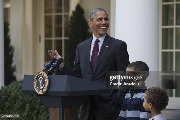 President Barack Obama pardons Tater, his last National Thanksgiving Turkey as President, during a ceremony in the Rose Garden at the White House in...