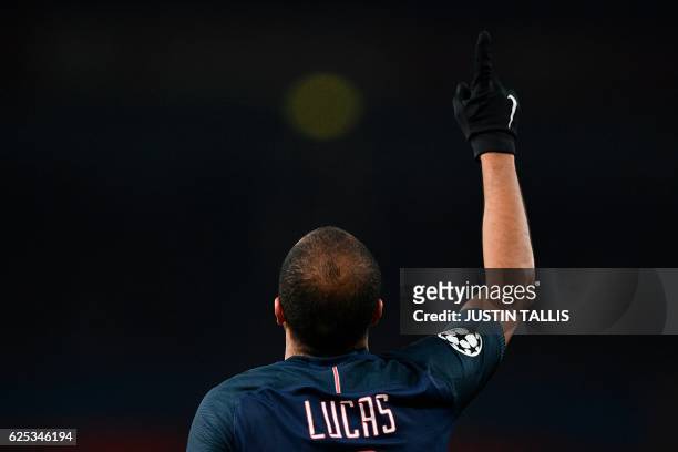 Paris Saint-Germain's Brazilian midfielder Lucas Moura celebrats scoring their second goal to equalise 2-2 during the UEFA Champions League group A...