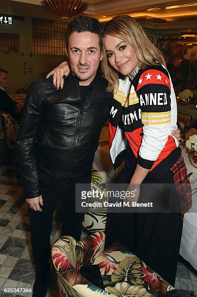 Dave Gardner and Rita Ora attend the adidas Originals by Rita Ora dinner at The Ivy Chelsea Garden on November 23, 2016 in London, England.