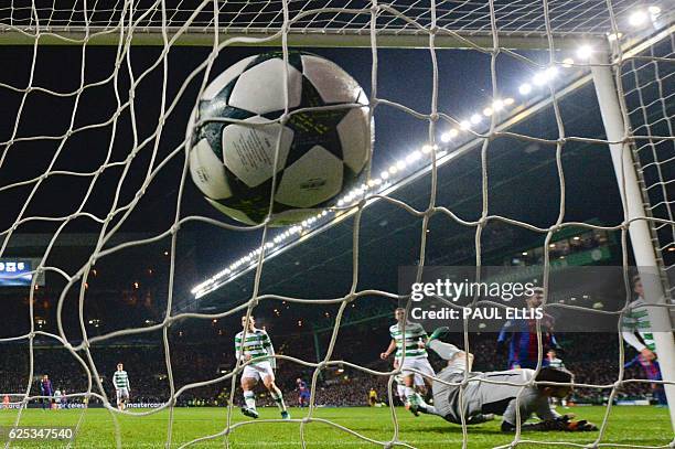 The ball slams into the back of the net after Barcelona's Argentinian striker Lionel Messi scored a penalty for Barcelona's second goal during the...