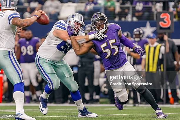 Baltimore Ravens Linebacker Terrell Suggs fights through a block by Dallas Cowboys Offensive Tackle Doug Free during the NFL game between the...