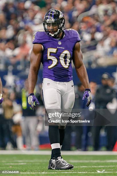 Baltimore Ravens Linebacker Albert McClellan peers into the backfield during the NFL game between the Baltimore Ravens and Dallas Cowboys on November...