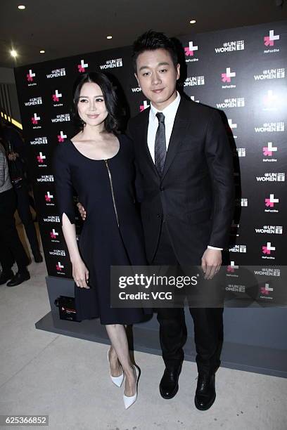 Actor David Tong and his wife Guan Yue attend a photography show as he is named Goodwill Ambassador for UN Women's Agency at 798 Art Zone on November...