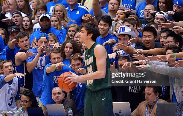 The Cameron Crazies taunt Paul Rowley of the William & Mary Tribe during the game against the Duke Blue Devils at Cameron Indoor Stadium on November...