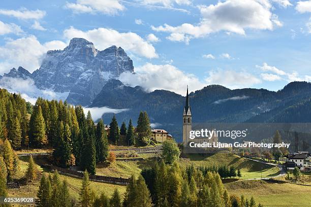 church of selva di cadore and monte pelmo peak, colle santa lucia dolomites, italy - colle santa lucia stock pictures, royalty-free photos & images