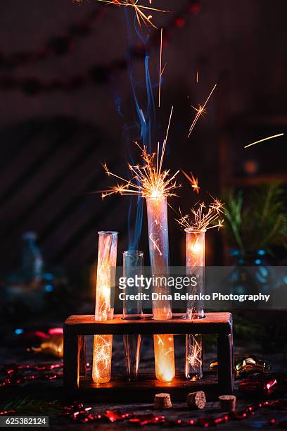 ready for christmas: still life with lights and fire - magie de noel stockfoto's en -beelden