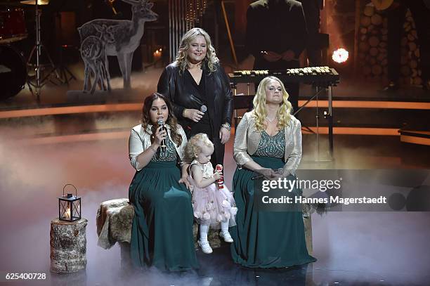 Anita Hegerland and her children Greta and Kaja, granddaughter Emmeline during the tv show 'Heiligabend mit Carmen Nebel' on November 23, 2016 in...