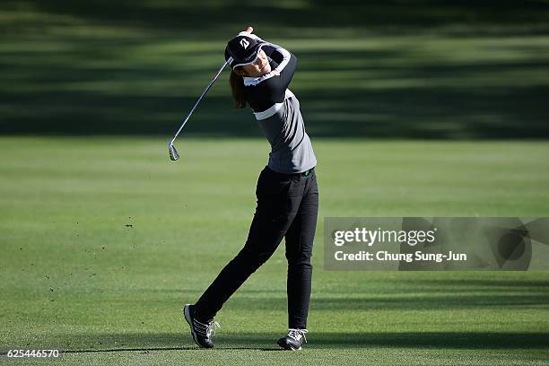 Ayaka Watanabe of Japan plays a shot on the 18th hole during the first round of the LPGA Tour Championship Ricoh Cup 2016 at the Miyazaki Country...