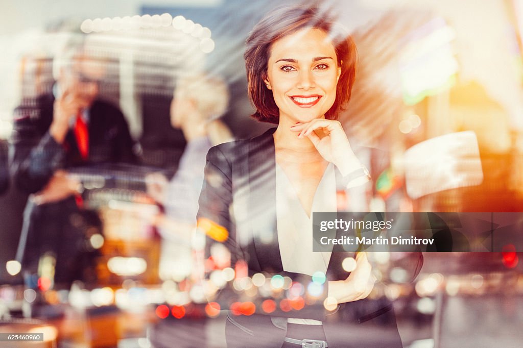 Businesswoman smiling to the camera