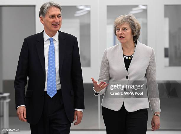 British Prime Minister, Theresa May and Chancellor of the Exchequer, Philip Hammond tour the Renishaw innovation and engineering plant on November...