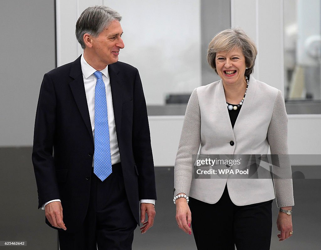 Theresa May And Philip Hammond Visit Renishaw Innovation and Engineering Plant