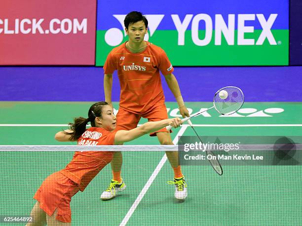 Arisa Higashino and Yuta Watanabe of Japan in action during their Mixed Doubles match against Tontowi Ahmad and Liliyana Natsir of Indonesia on Day 3...