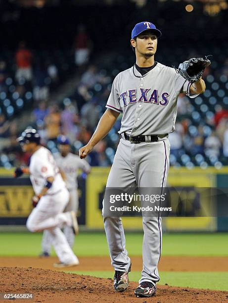 United States - Photo shows Texas Rangers pitcher Yu Darvish after Houston Astros catcher Carlos Corporan homered during the eighth inning of a game...