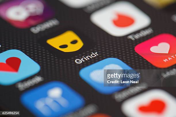 The "Grindr" app logo is seen amongst other dating apps on a mobile phone screen on November 24, 2016 in London, England. Following a number of...