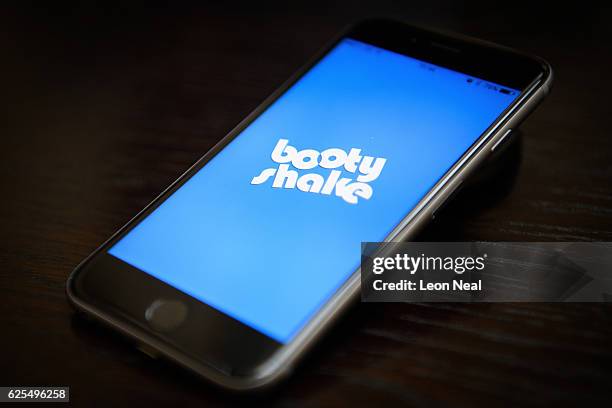 The "BootyShake" app logo is seen on a mobile phone screen on November 24, 2016 in London, England. Following a number of deaths linked to the use of...