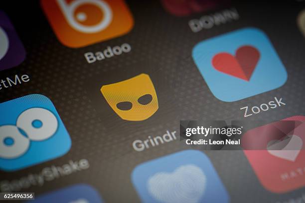 The "Grindr" app logo is seen amongst other dating apps on a mobile phone screen on November 24, 2016 in London, England. Following a number of...