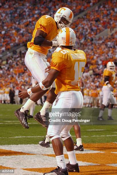 Donte Stallworth of Tennessee celebrates his second quarter two point conversion with teammate Kelly Washington to give the Vols a 14-0 lead over...