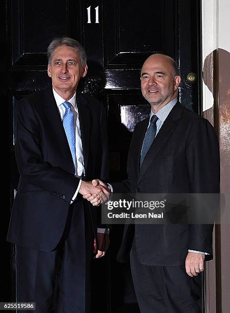 Chancellor of the Exchequer, Philip Hammond greets Pierre Moscovici, the European Commissioner for Economic and Financial Affairs at 11 Downing...