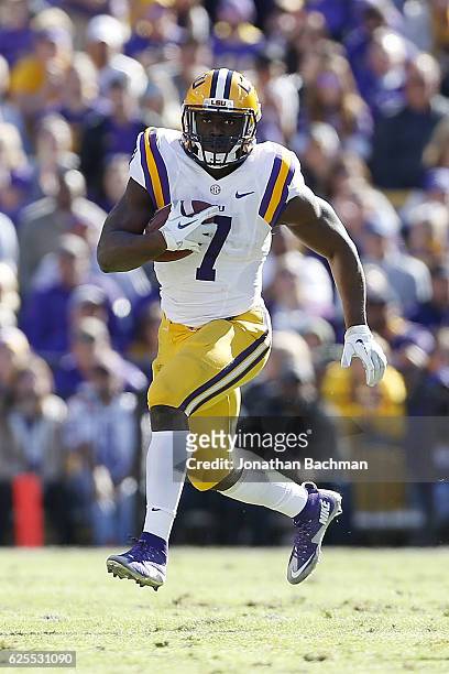 Leonard Fournette of the LSU Tigers runs with the ball during a game against the Florida Gators at Tiger Stadium on November 19, 2016 in Baton Rouge,...