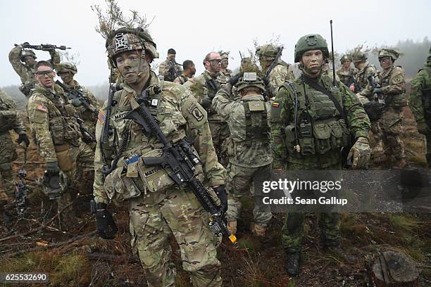 Members of the U.S. 173rd Airborne Brigade and Lithuanian infantry soldiers participate in the Iron Sword multinational military exercises on...