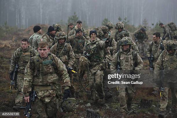 Members of the British Army 1st Battalion of The Mercian Regiment participate in the Iron Sword multinational military exercises on November 24, 2016...