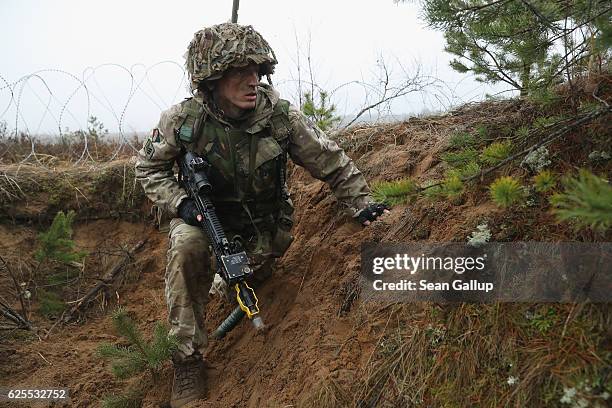 Member of the British Army 1st Battalion of The Mercian Regiment participates in the Iron Sword multinational military exercises on November 24, 2016...