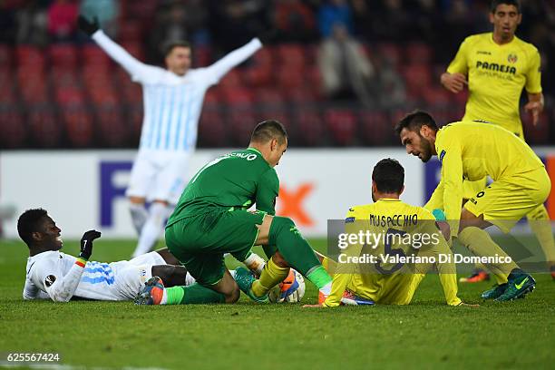 Mousse Kone of FC Zurich competes for the ball with Sergio Asenjo, Mateo Musacchio and Victor Rui of Villareal during the UEFA Europa League match...