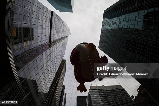 The Angry Bird balloon floats down 6th Av, during the 90th Macy's Annual Thanksgiving Day Parade on November 24, 2016 in New York City. Security was...