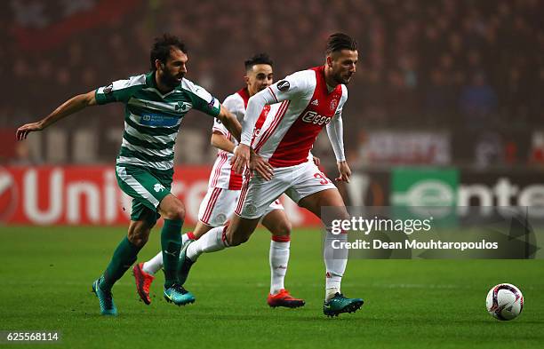 Mitchell Dijks of Ajax and Giorgios Koutroubis of Panathinaikos battle for the ball during the UEFA Europa League Group G match between AFC Ajax and...