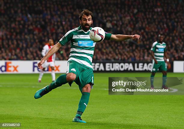 Giorgios Koutroubis of Panathinaikos clears the ball during the UEFA Europa League Group G match between AFC Ajax and Panathinaikos FC at Amsterdam...