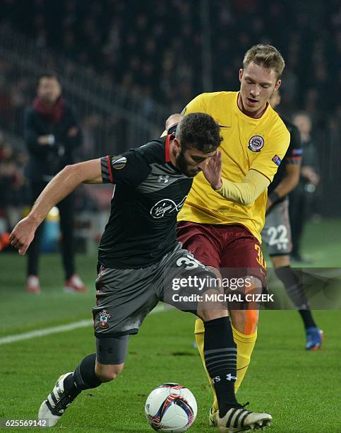 Lukas Julis of AC Sparta Praha vies for the ball with Sam McQueen of Southampton FC during the UEFA Europa League group K football match between AC...