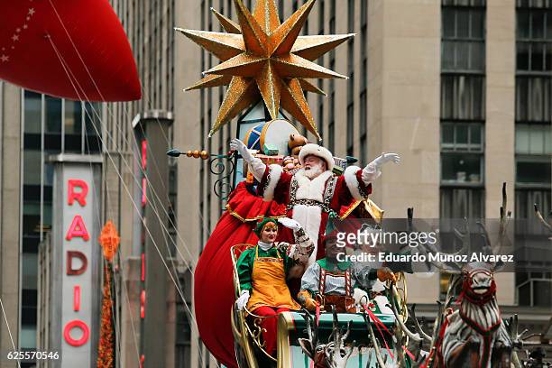 Santa Claus proceeds down 6th Av, during the 90th Macy's Annual Thanksgiving Day Parade on November 24, 2016 in New York City. Security was tight in...